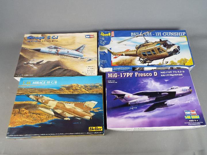 Hobby Boss, Revell, Heller - Four boxed plastic model kits in various scales.