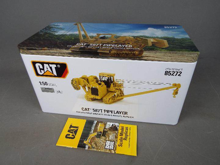 Diecast Masters - A boxed 1:50 scale #85272 Cat 587T Pipelayer by Diecast Masters. - Image 2 of 3