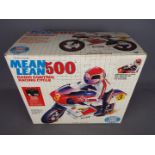 Galoob - A boxed vintage 'Mean Lean 500' radio control racing cycle.