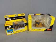 Norscot - Two boxed 1:50 scale diecast Norscot Construction vehicles.