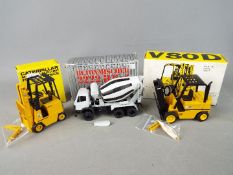 Conrad, NZG - Three boxed diecast construction vehicles in various scales.