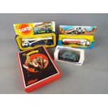 Leader, Schuco, Corgi - Four boxed diecast and resin models.