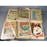 A collection of vintage comics including Dandy, Beano, Beezer,