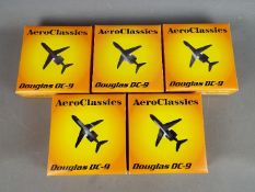 Aero Classics - Five boxed 1:400 scale diecast model Douglas DC-9 aeroplanes in various liveries,