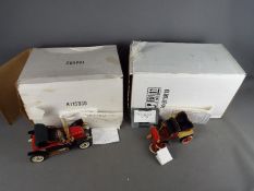 Franklin Mint - Two boxed Franklin Mint diecast vehicles.