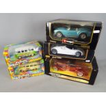 Maisto, Bburago, Ertl - Five boxed diecast model cars in 1:18 and 1:24 scale.