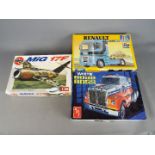 AMT, Italeri, Airfix - Three boxed plastic model kits in various scales.