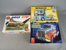 AMT, Italeri, Airfix - Three boxed plastic model kits in various scales.