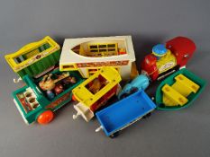 Fisher Price - A small collection of unboxed vintage Fisher Price toys.