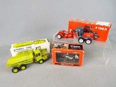BYMO, Conrad, NZG - Three boxed 1:50 scale diecast construction vehicles.