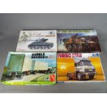 Dragon, Trumpeter, AMT, Italeri - Four boxed plastic model kits in various scales.