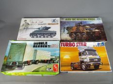 Dragon, Trumpeter, AMT, Italeri - Four boxed plastic model kits in various scales.