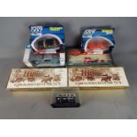 Corgi, Maisto, Oxford Diecast - Seven boxed diecast model vehicles in various scales.