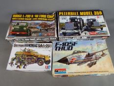 Monogram, Tamiya, Lindberg - Four boxed plastic model kits in various scales.