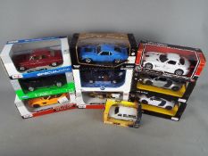 Maisto, Welly, Motor Max, Rastar,Jada - Ten boxed diecast model vehicles in various scales.