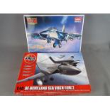 Academy, Airfix - Two boxed plastic model aircraft kits in 1:48 scale.