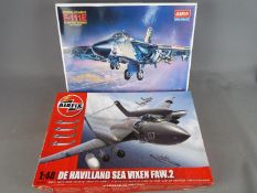 Academy, Airfix - Two boxed plastic model aircraft kits in 1:48 scale.