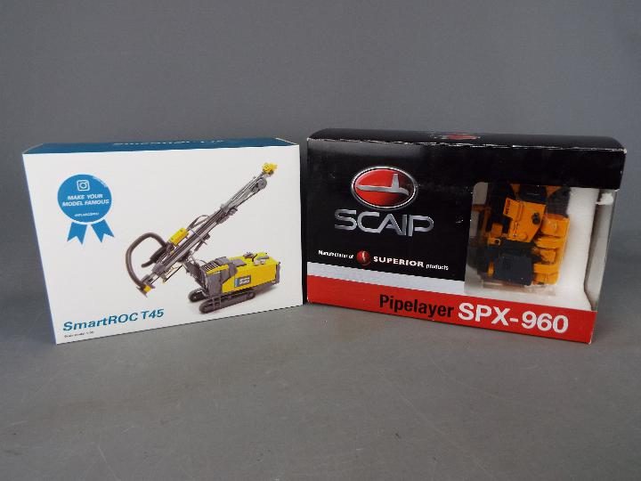 ROS Models, AtlasCopco - Two boxed 1:50 scale construction vehicles.