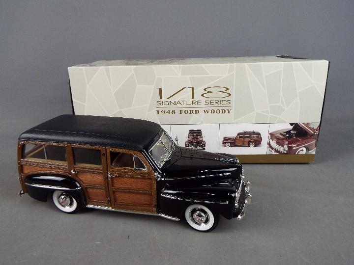 Lucky Diecast - A boxed 1:18 scale Lucky Diecast Signature Series 1948 Ford Woody.