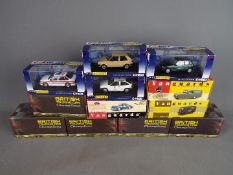 Corgi, Vanguards, Atlas editions - 12 boxed diecast model cars.