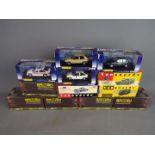 Corgi, Vanguards, Atlas editions - 12 boxed diecast model cars.