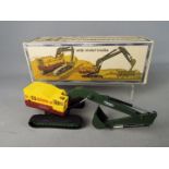 NZG - A boxed 1:50 scale NZG #139 Bucyrus Erie 40H Hydraulic Excavator The model in yellow,