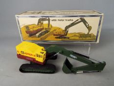 NZG - A boxed 1:50 scale NZG #139 Bucyrus Erie 40H Hydraulic Excavator The model in yellow,