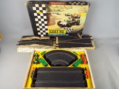 Scalextric - A vintage boxed Scalextric set no. FJ31 with two boxed items of Scalextric Track.