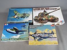 Tamiya, Academy, Fujimi - Four boxed plastic model kits in various scales.