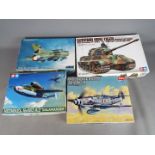 Tamiya, Academy, Fujimi - Four boxed plastic model kits in various scales.