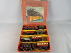 Hornby - A boxed Hornby O Gauge Goods Set. Lot contains Two clockwork locos (0-2-0 Op.No.