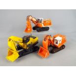 Joal, Shinsei, Diapet - Three unboxed diecast construction Excavators in various scales.