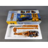 BYMO - A boxed diecast 1:50 scale BYMO Bauer BG40 Rotary Drilling Rig with BC40 Trenchcutter.