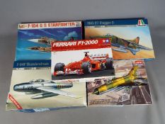 Italeri, Tamiya, Esci, Academy - Five boxed plastic model kits in various scales.