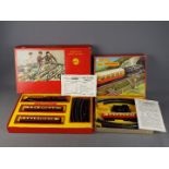 Triang, Hornby - Two boxed Triang OO gauge electric train sets.