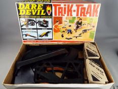 Triang - A vintage Triang 'Dare Devil Trik - Trak'.