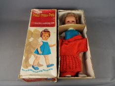 Palitoy - A boxed vintage Patti Pitta-Pat a 21" electric walking vinyl doll by Palitoy.