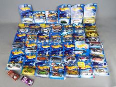 Hot Wheels - 37 carded Hot Wheels diecast vehicles on long and short cards from various ranges.