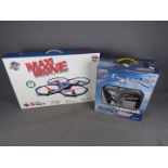 MDD, RDM - Two boxed radio controlled vehicles,