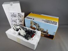 NZG - A boxed 1:50 scale diecast NZG #8601 Liebherr R9400 Mining Excavator.