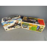 Nikko - Two boxed vintage radio controlled model vehicles by Nikko.