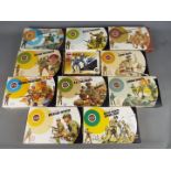 Airfix - A regiment of 11 boxed Airfix 1:32 scale plastic soldiers majority in 'Target' boxes.