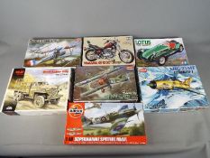 Tamiya, Academy, ICM, Airfix - Seven boxed plastic model kits in various scales.