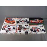 Fujimi. Tamiya - Six boxed plastic model car kits in various scales.