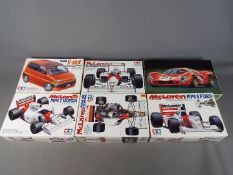 Fujimi. Tamiya - Six boxed plastic model car kits in various scales.