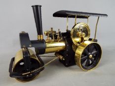 Wilesco - An unboxed Wilesco live steam D366 'Old Smoky' brass and black steam roller.