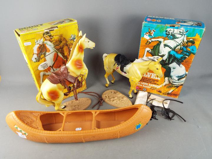 Marx - Two boxed 'The Lone Ranger' horses including 'Silver' and 'Scout' and an unboxed Canoe