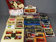 Lledo - 11 boxed Lledo diecast vehicle sets with a 10 individually boxed diecast vehicles by Lledo.