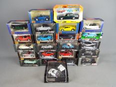 Detail Cars, Matchbox, Maisto, Others - 23 boxed diecast model vehicles in various scales.