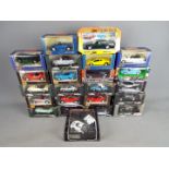 Detail Cars, Matchbox, Maisto, Others - 23 boxed diecast model vehicles in various scales.